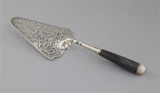 An early George III pierced silver fish slice, 32cm.